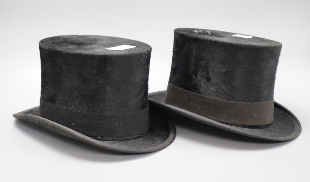 Two vintage black top hats, interior initialled AWL and AEL, length 19.5 width 15.5cm